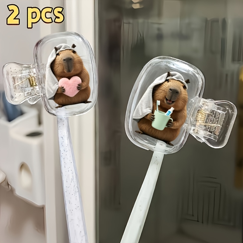 Home Essentials Bathroom Accessories - 하트와 칫솔모 커버를 들고 있는 카피바라